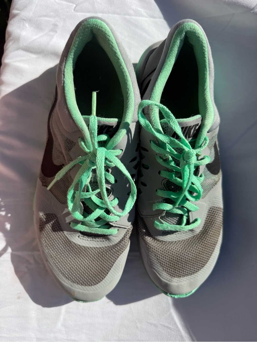 Nike Women's Gray Sneakers with Mint Green Accents